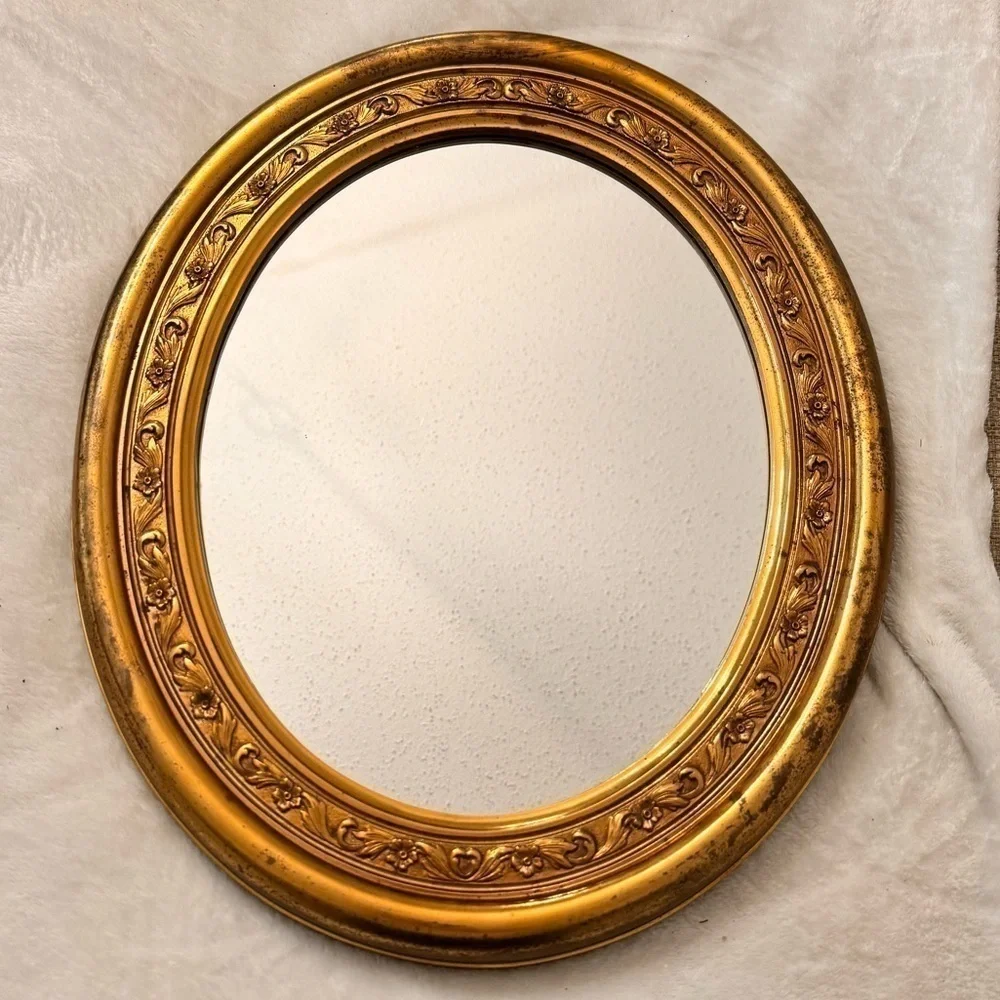beautiful vintage gold plastic oval mirror